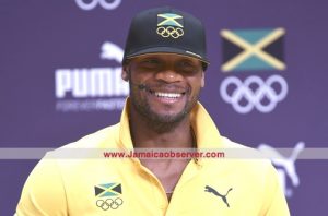 Powell... one, two, three for Jamaica in 100m